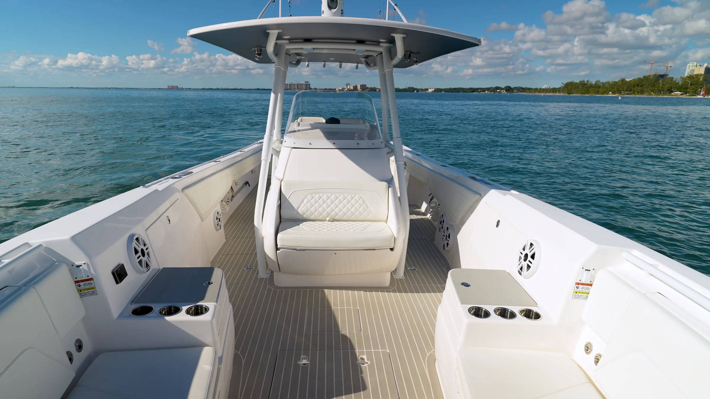 The view forward from the console: hardtop, bow seating and open water